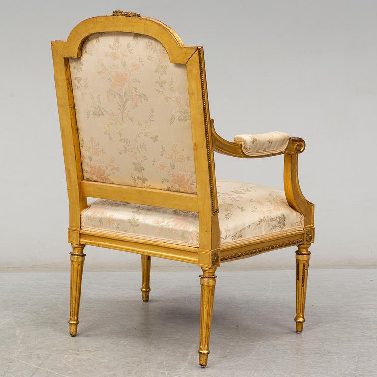 A late 19th century Louis XVI-style armchair.