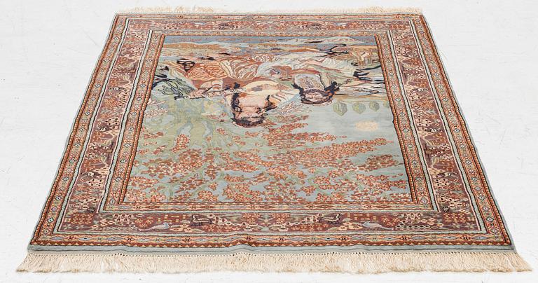 An oriental figural rug, c. 182 x 128 cm.