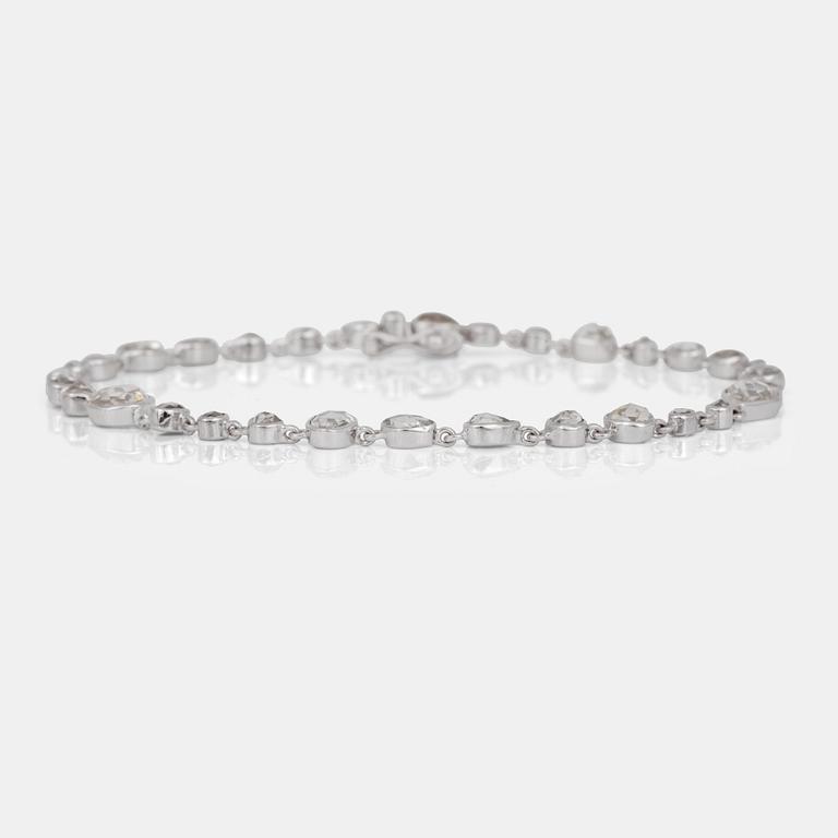 A rose-cut diamond, circa 5 cts, bracelet.