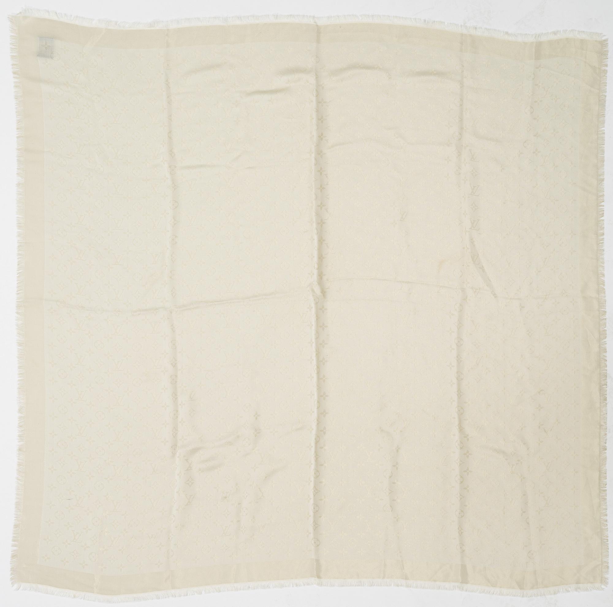 Louis Vuitton, a silk mix shawl.