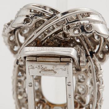 CARTIER, brosch/klädclip, med briljantslipade diamanter ca 2.98 ct, ca 1940/50-tal.