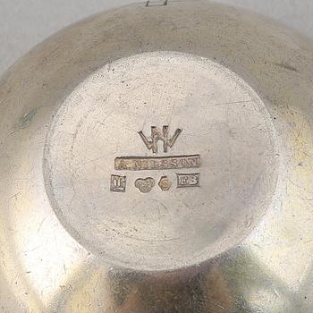 A silver and wood tea strainer by Wiwen Nilsson, Lund, 1932.