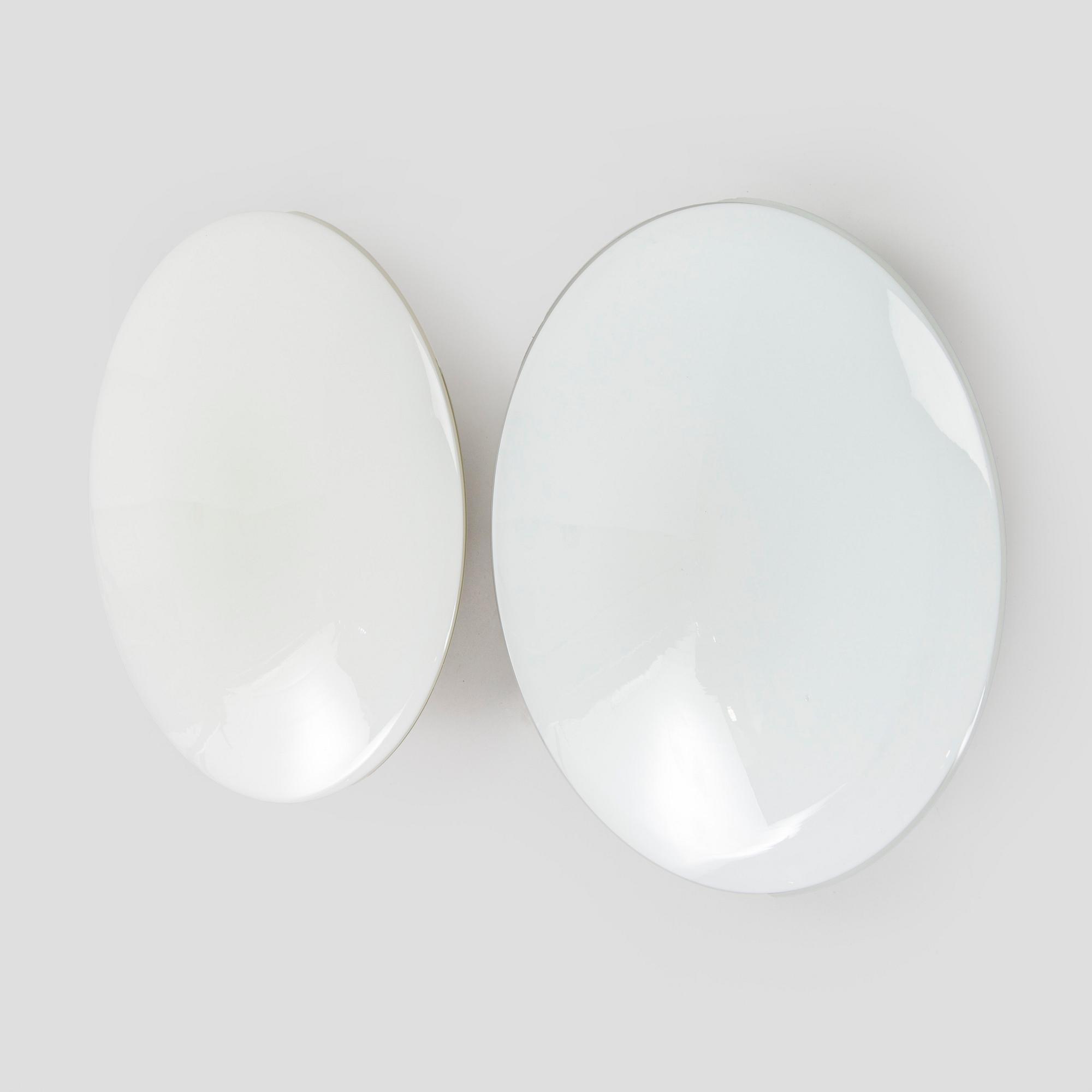 Arne Jacobsen, ceiling lamps/wall lamps, a pair, "AJ-Eklipta", Louis Poulsen, Denmark.