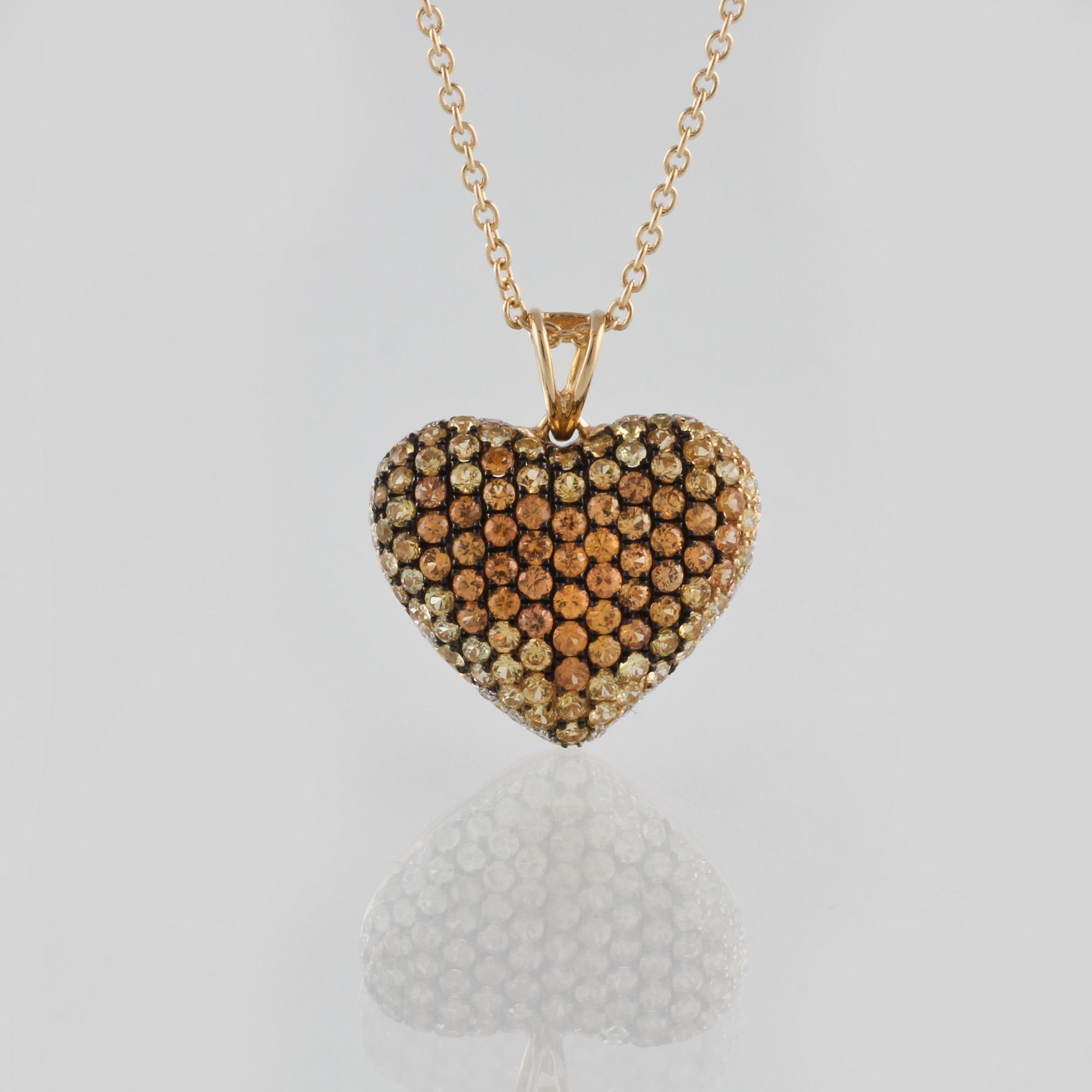 HÄNGE, 18K guld med briljantslipade diamanter ca 0.11 ct samt gula safirer ca 1.47 ct. Vikt 5,2 gram.