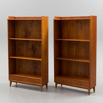 A pair of teak veneered shelves, mid 20th century.