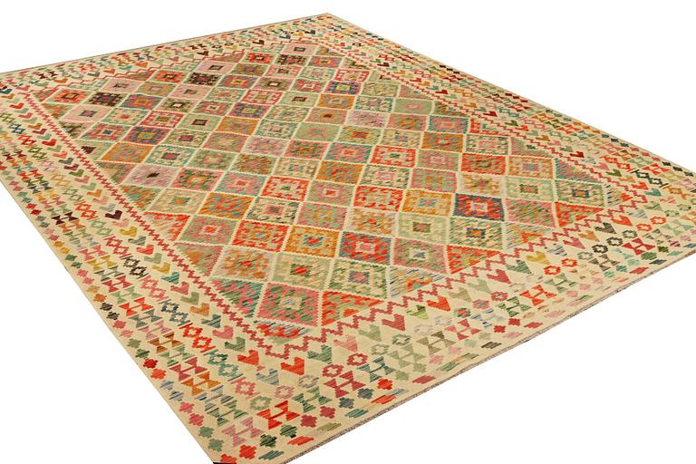 A Kilim carpet, c. 390 x 306 cm.