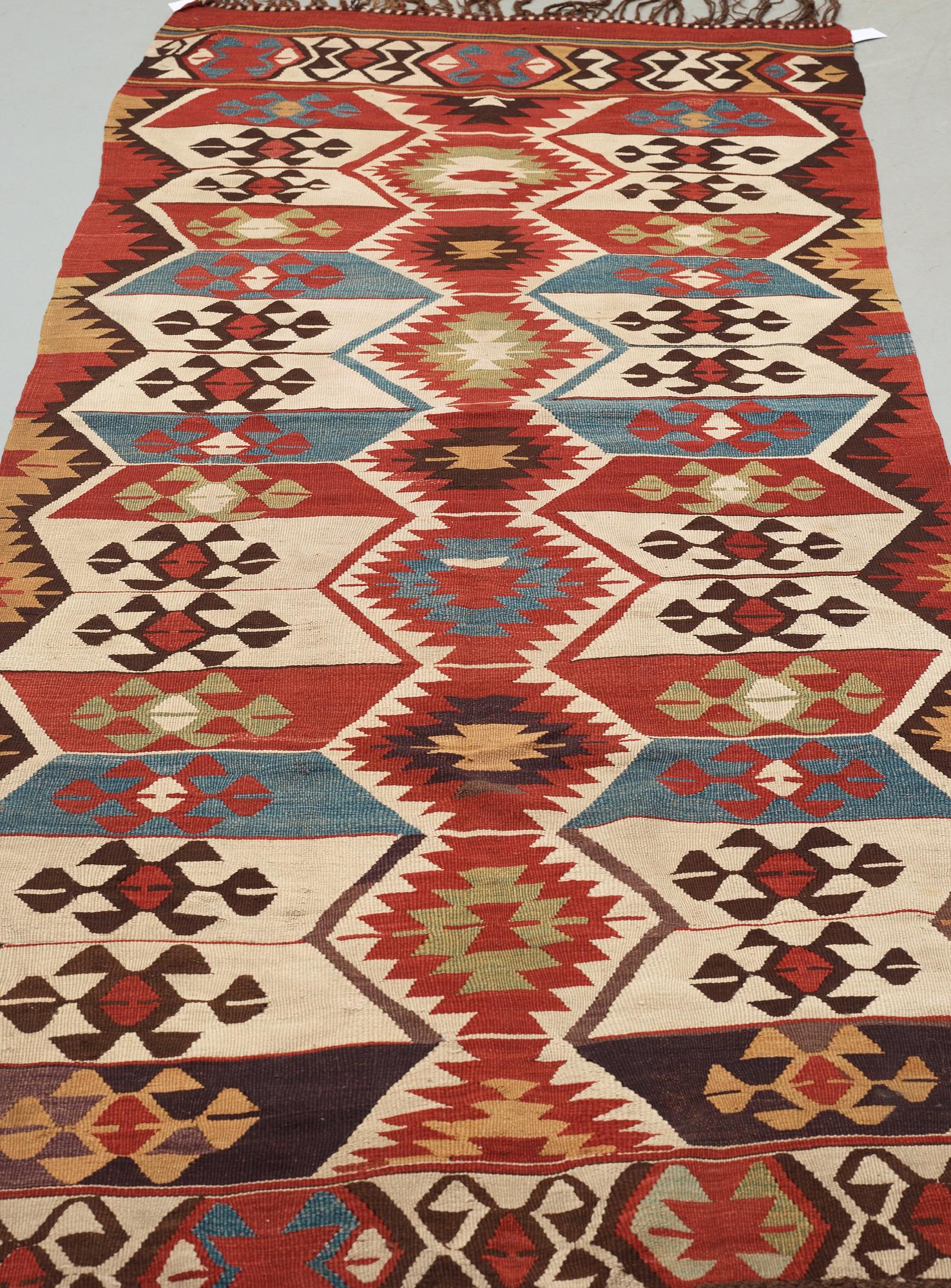 ANTIQUE ANATOLIAN KILIM, possibly Mut (south of Konya). 290,5 x 118 cm.