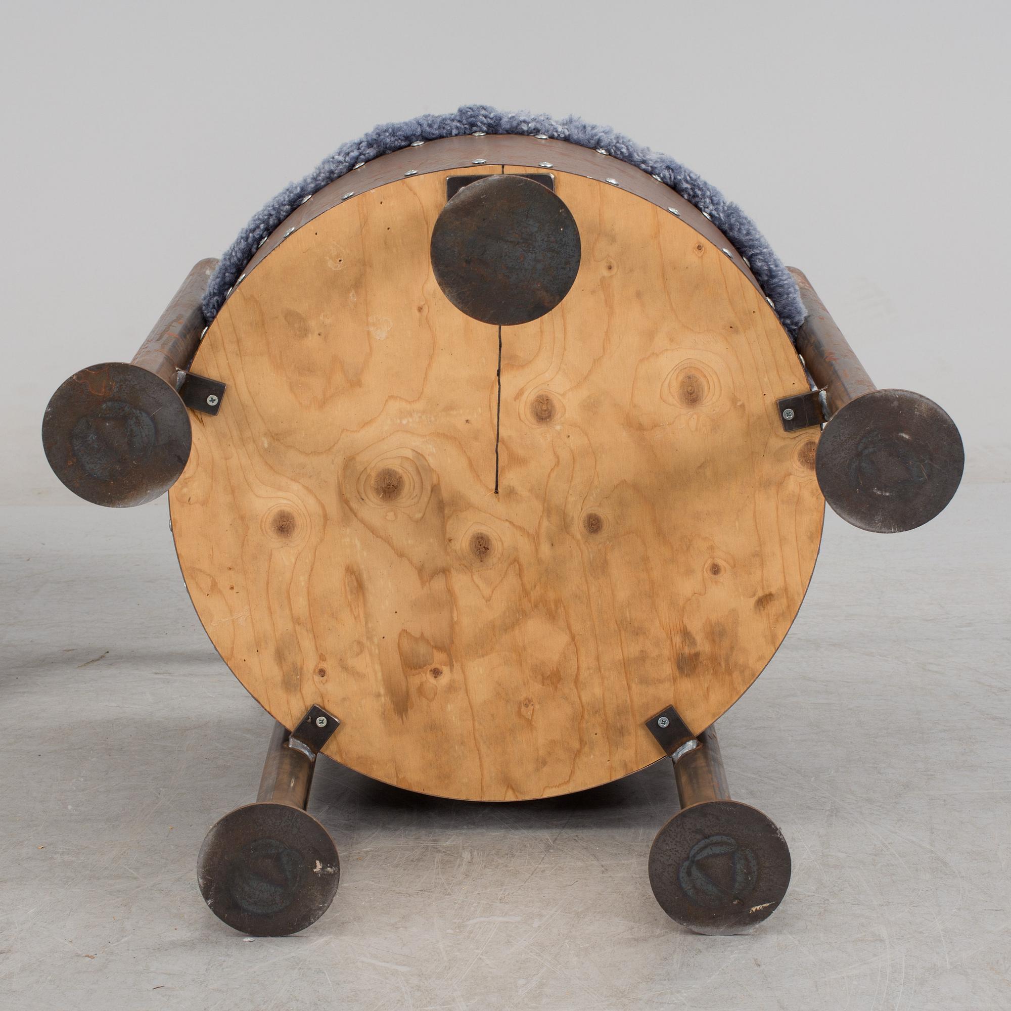 A pair of steel chairs by Arpad Földessy, 21st Century.