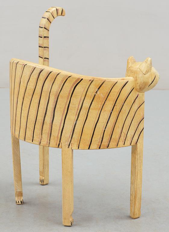A Gérard Rigot painted wood child chair, France 1980's-90's.