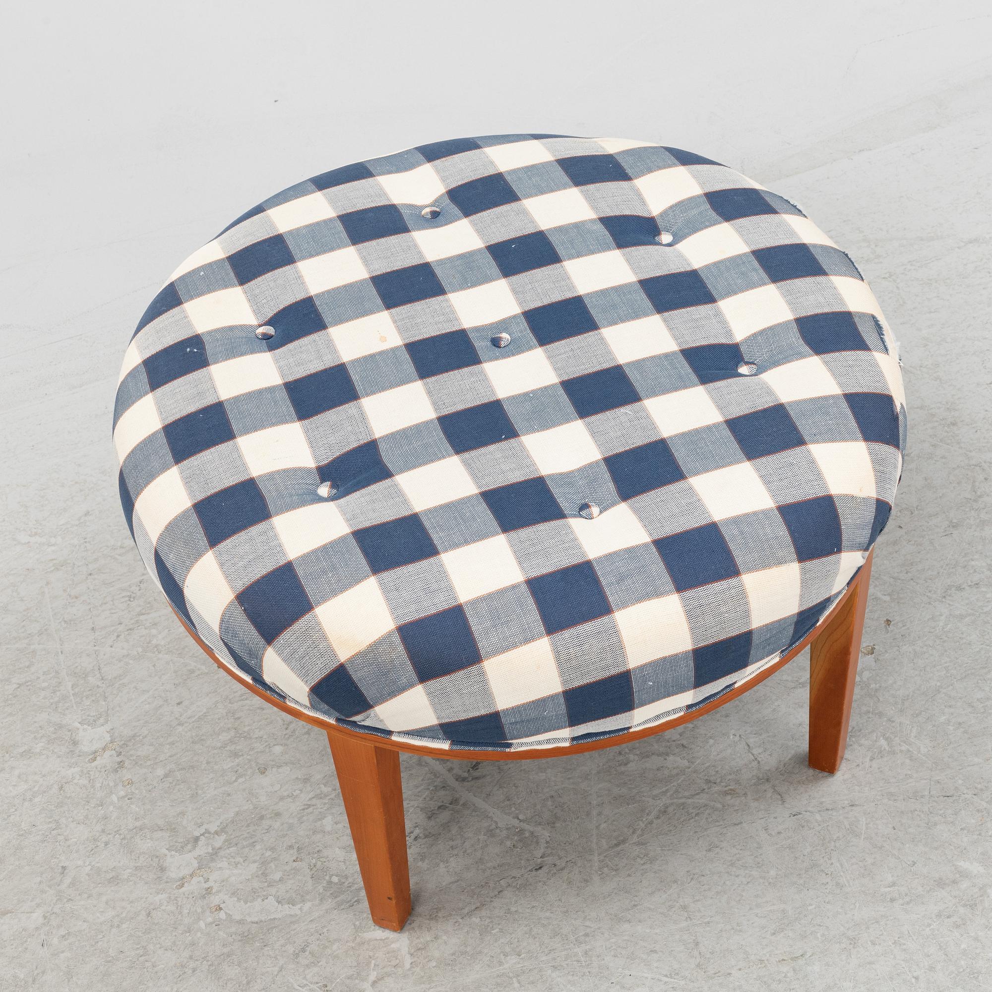 Josef Frank, a model 647 cherry wood stool by Firma Svenskt Tenn.