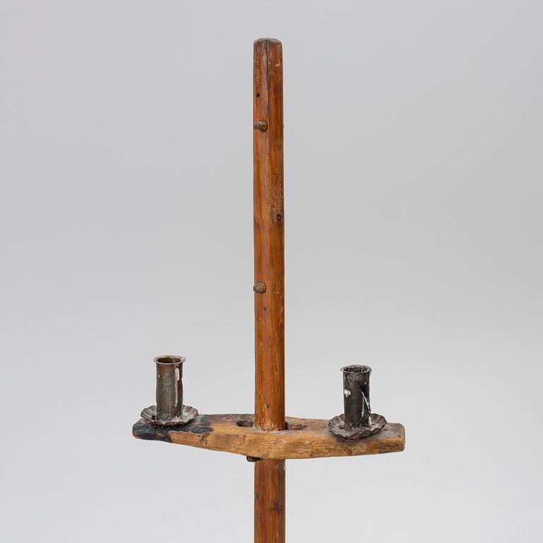 A floor candlestick, 19th Century.