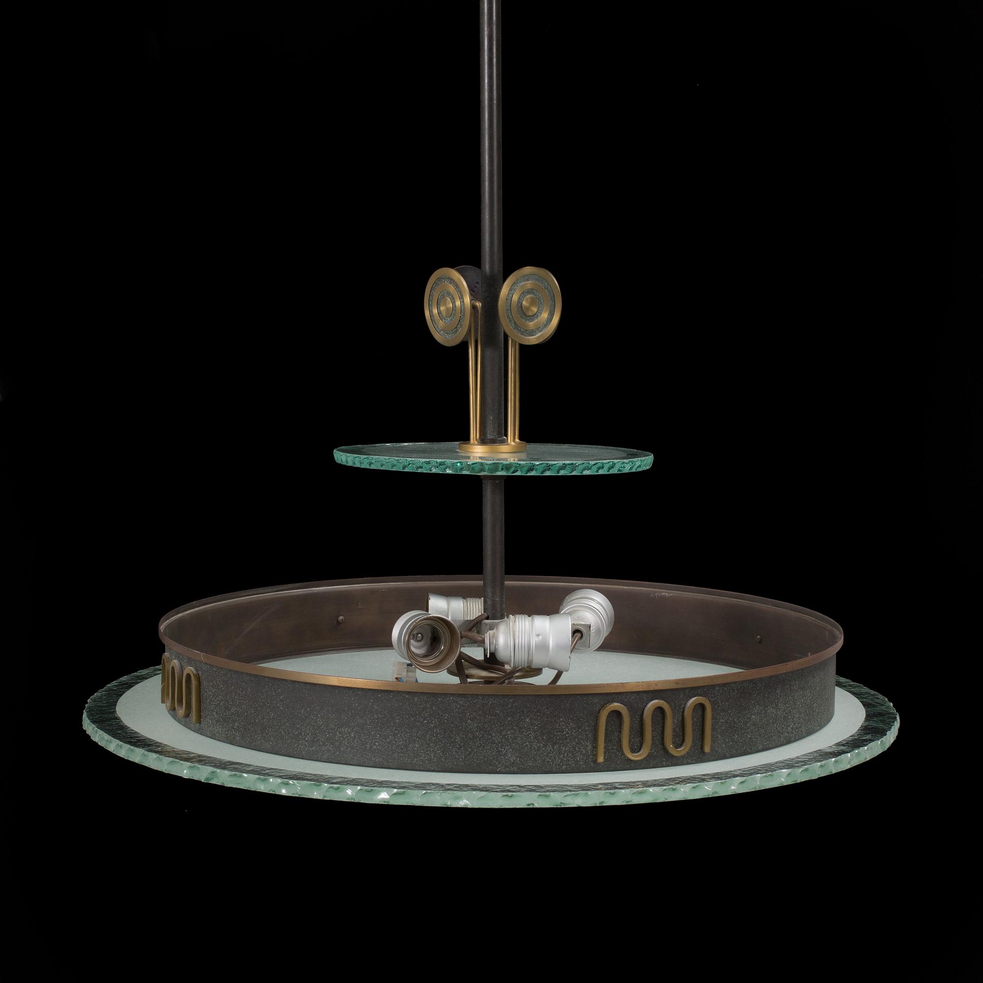 A 1920s art déco ceiling light.