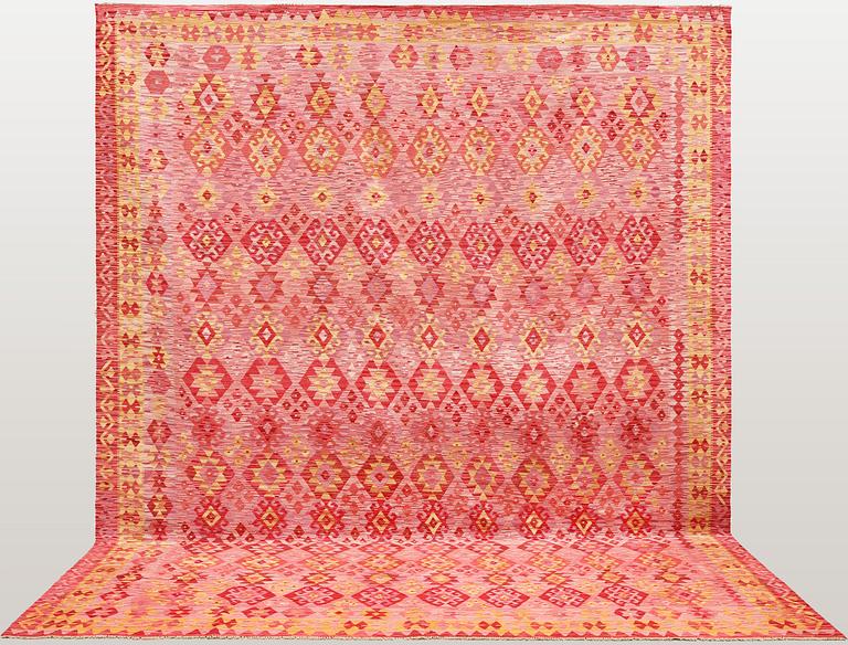 A Kilim carpet, approx. 384 x 317 cm.