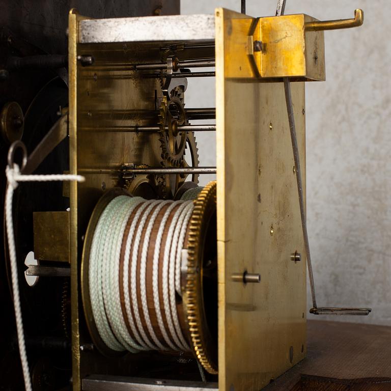 A 18th century long case clock.