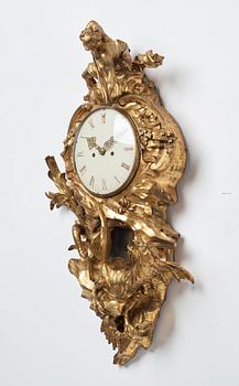 A Louis XV mid 18th century gilt bronze wall clock marked "Caffieri fecit".