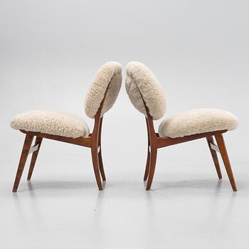A pair of mid 20th century lounge chairs.