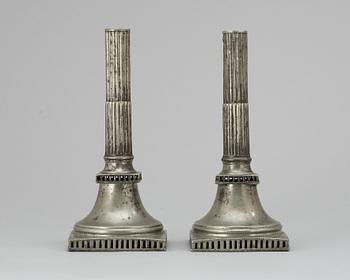 585. A pair of Gustavien pewter candlesticks.