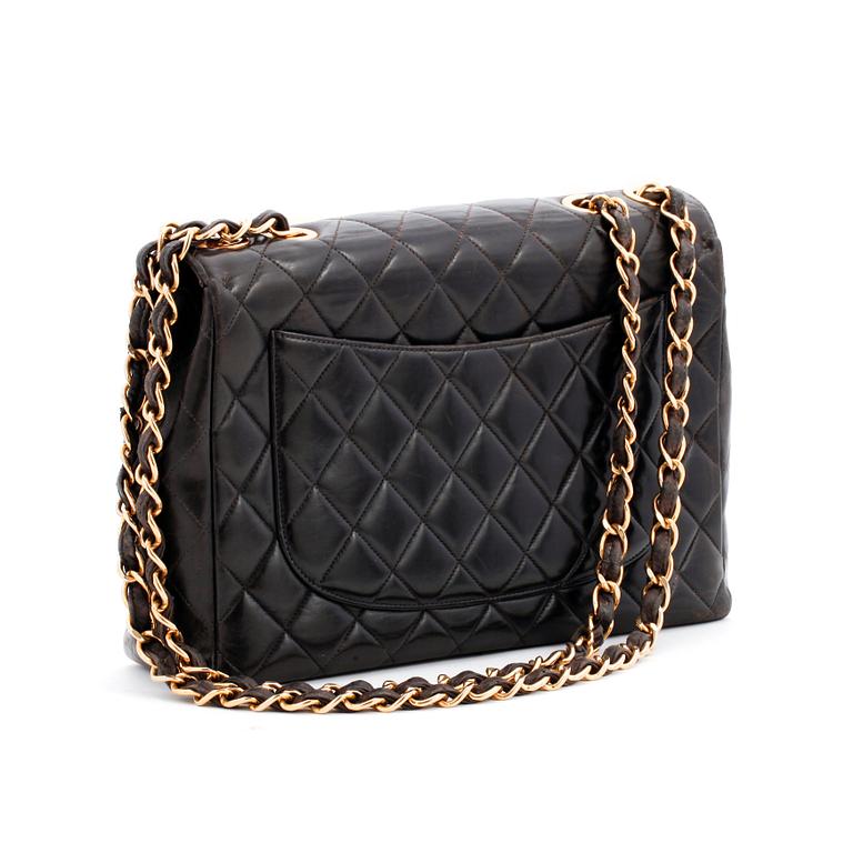 CHANEL, a quilted black leather shoulder bag, "Flap bag".