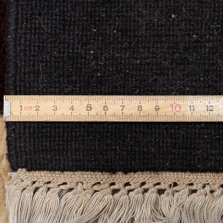 A carpet, c. 460 x 370 cm.