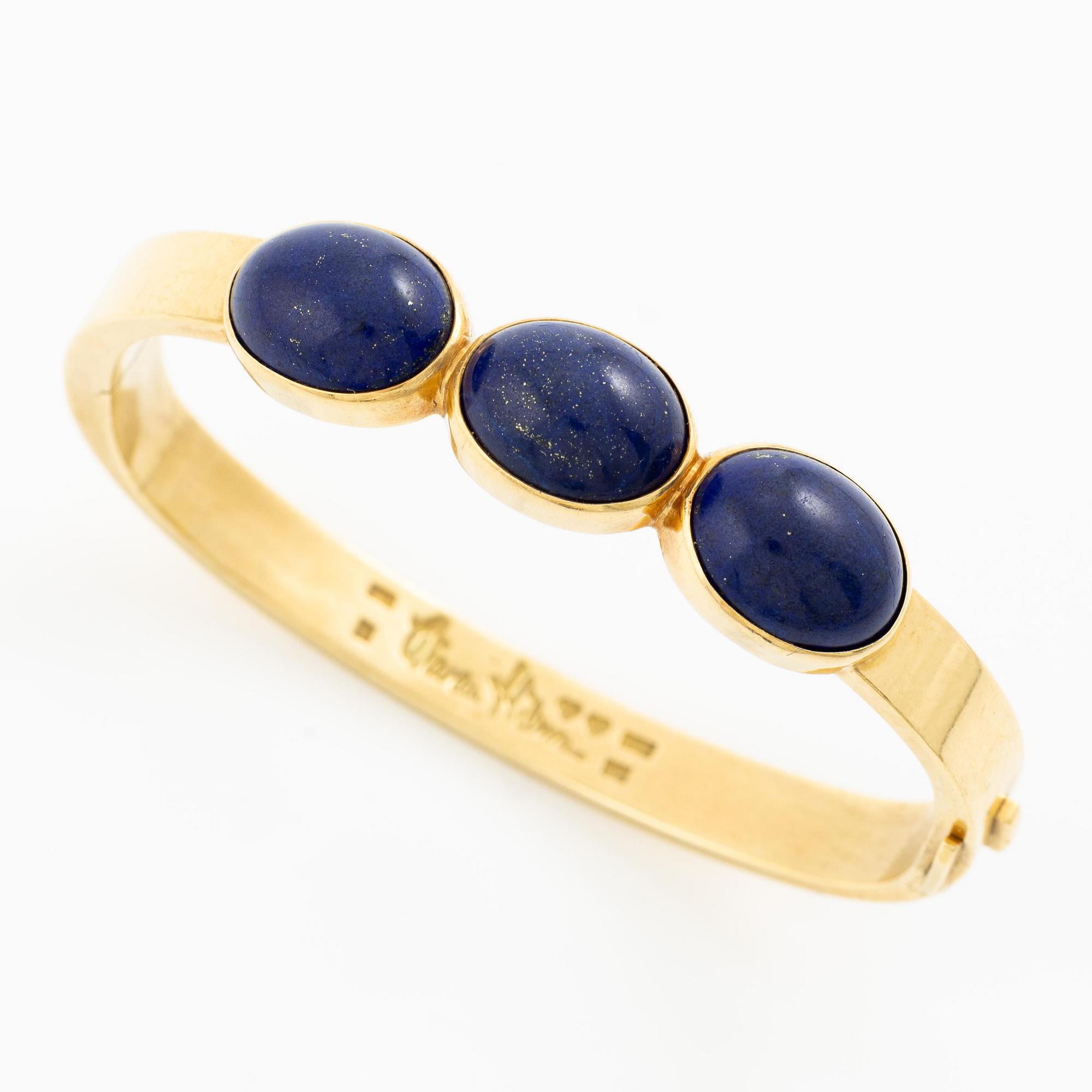 Wiwen Nilsson, a bracelet, 18K gold with lapis lazuli, Lund 1965.