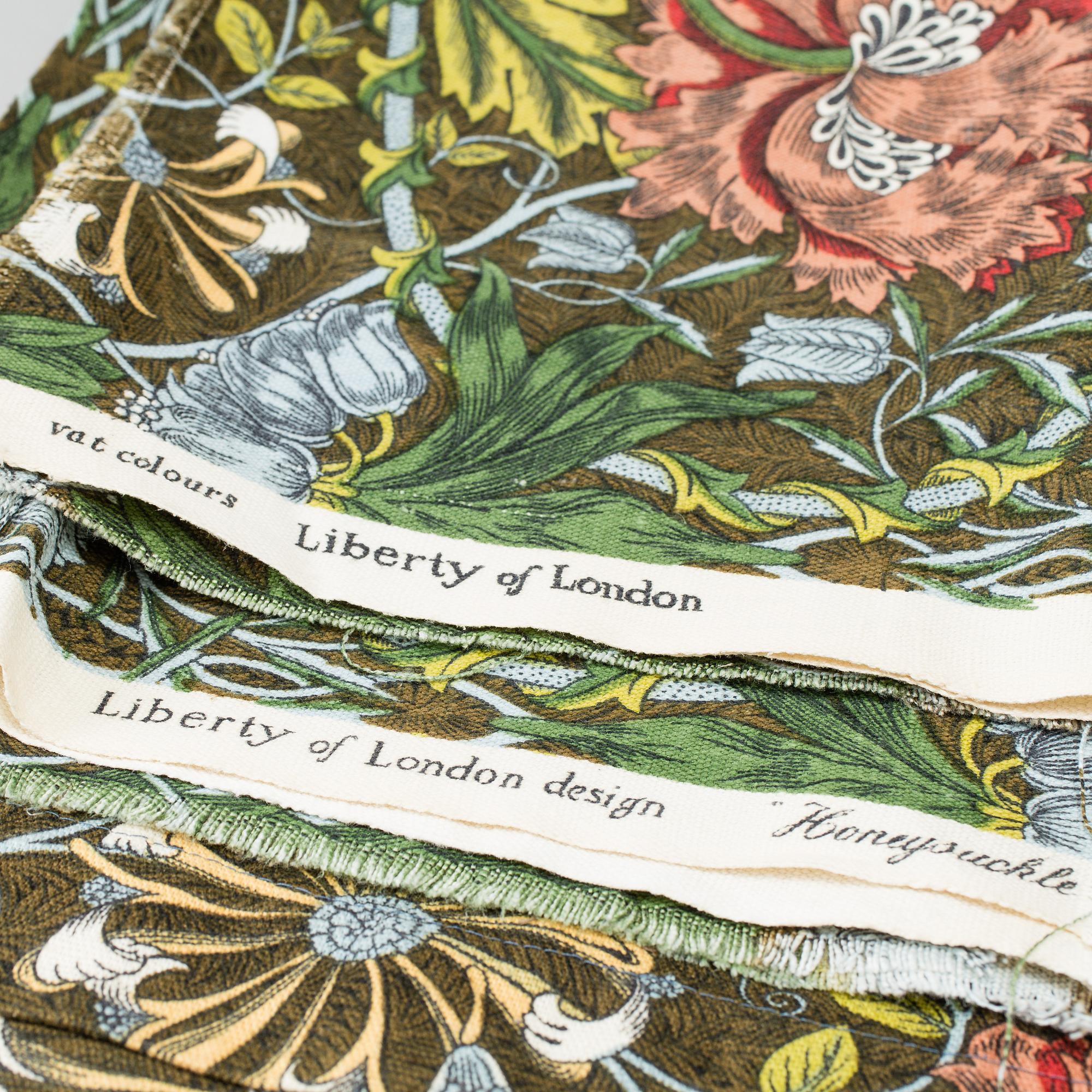 Curtains and tablecloth, including William Morris 'Honeysuckle and Tulip' and 'Chrysanthemum', 20th Century.