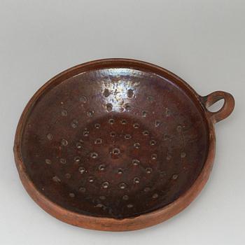 Two pottery strainers, 19th Century, Sweden.