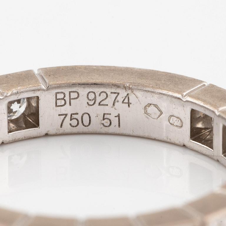 An 18K white gold Cartier ring set with round brilliant-cut diamonds.