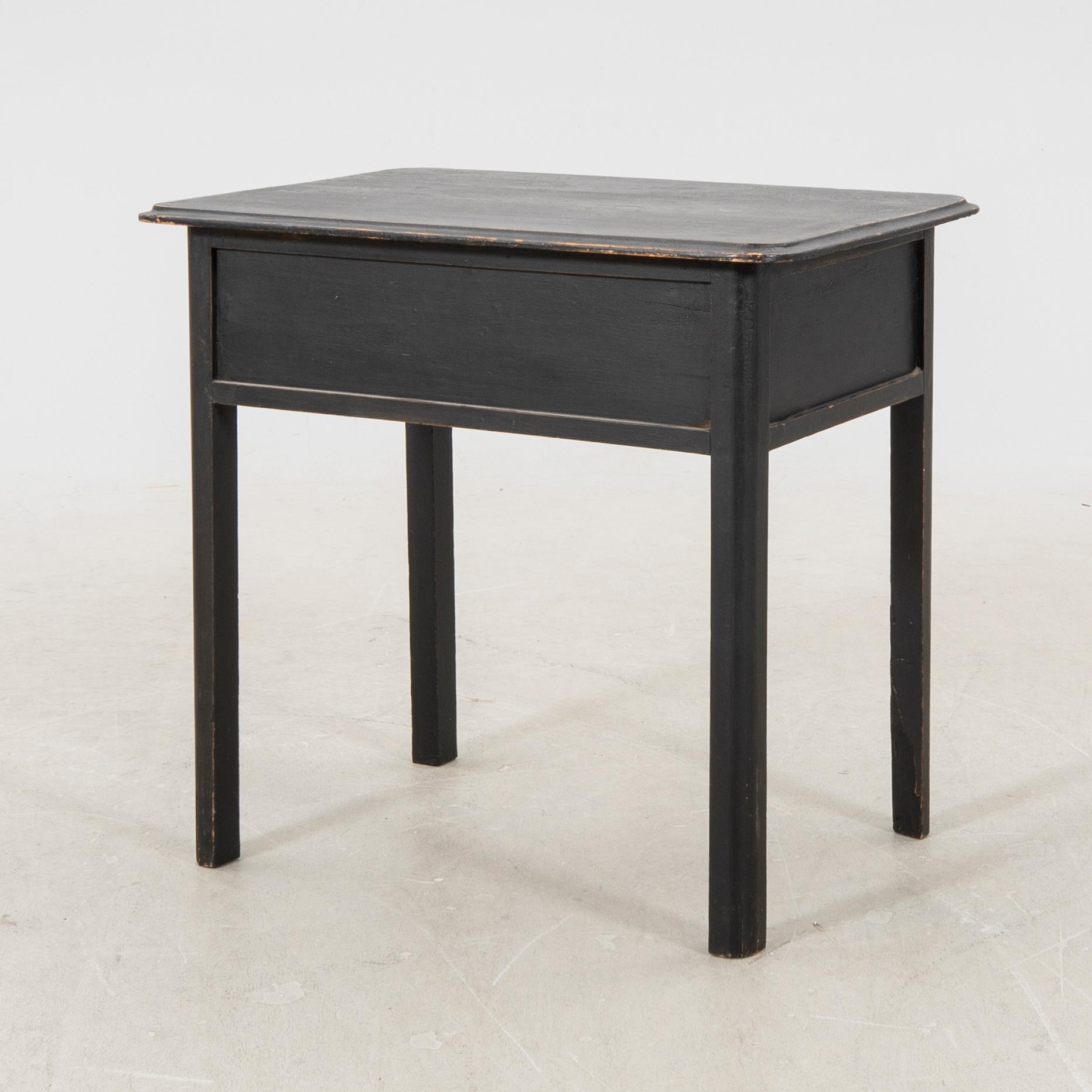 A painted table later part of the 20th century.