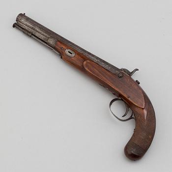 A mid 19th century percussion pistol.