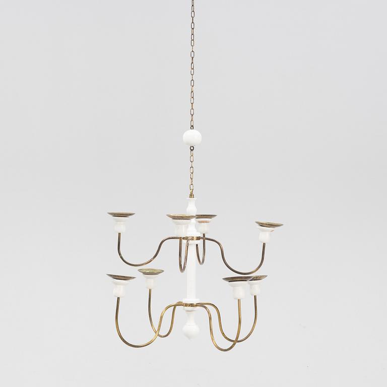 Josef Frank, a model '2586' wodden and brass chandelier, Firma Svenskt Tenn.