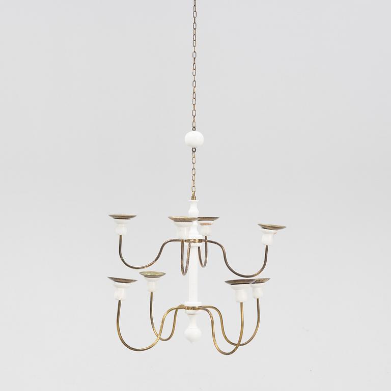 Josef Frank, a model '2586' wodden and brass chandelier, Firma Svenskt Tenn.