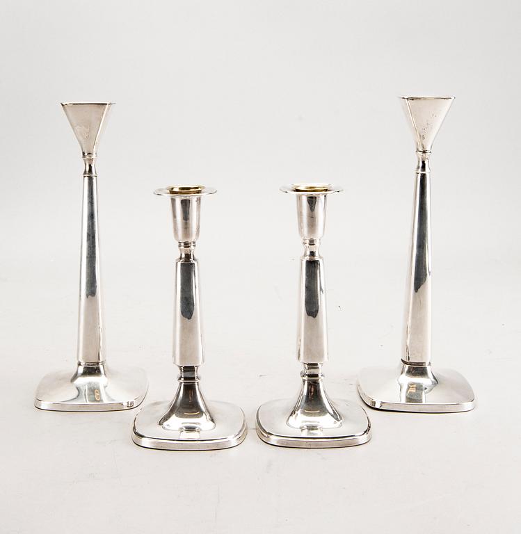 A Swedish 20th century set of two pairs of candlesticks mark of T Eldh Göteborg 1968-70.