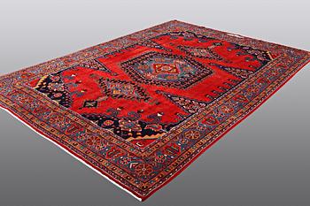 A CARPET, Wiss Signed Sharbani.  327 x 227 cm.