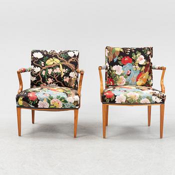 Josef Frank, two mahogany and rattan armchairs, model 969, Firma Svenskt Tenn.