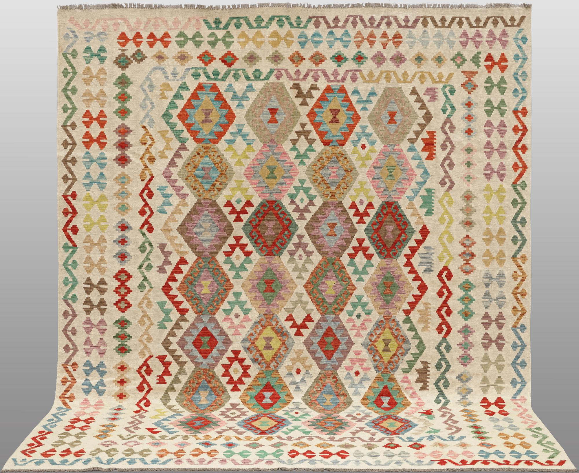 A Kilim rug, approx. 299 x 250 cm.