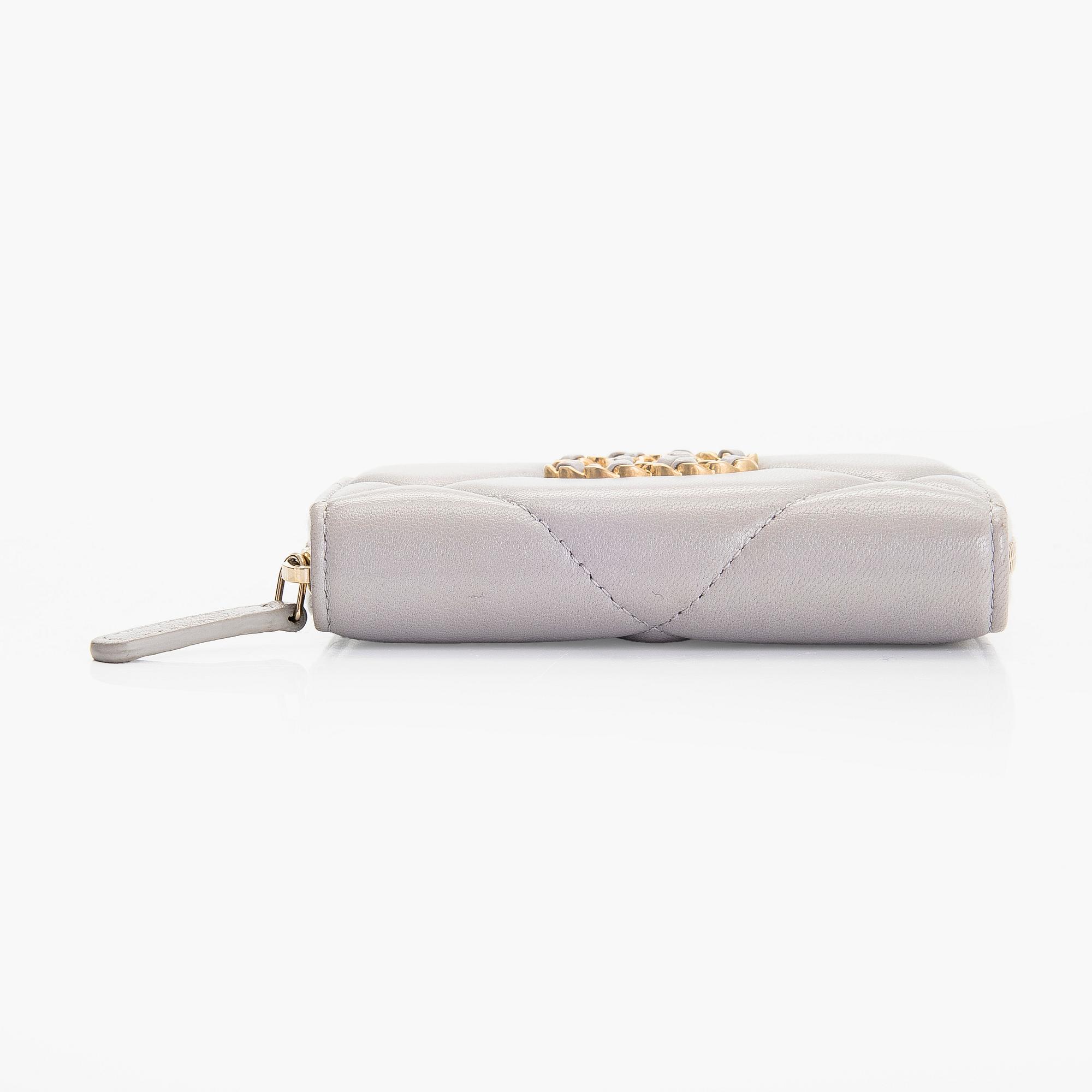 Chanel, A "19 O-coin purse" wallet.