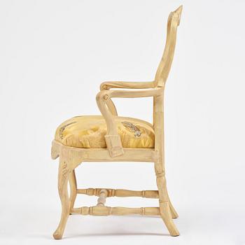 A rococo open armchair in the manner of C M Sandberg, Stockholm, later part 18th century.
