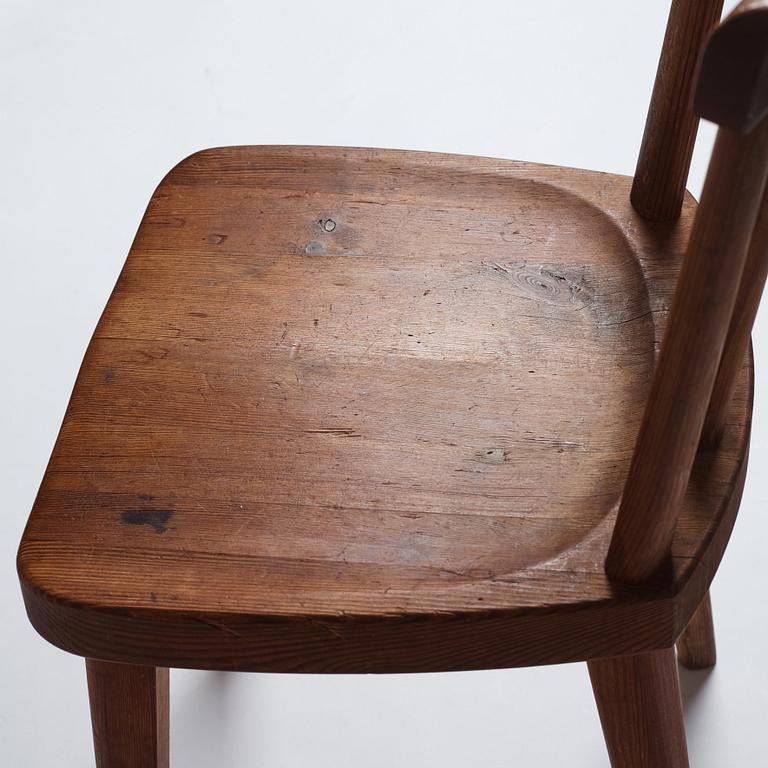 Axel Einar Hjorth, a pair of stained pine 'Utö' chairs, Nordiska Kompaniet, Sweden 1930s.