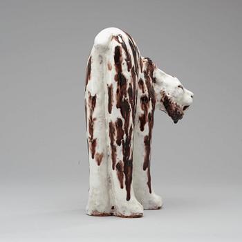 A Taisto Kaasinen glazed ceramic sculpture of a lynx, Upsala-Ekeby.