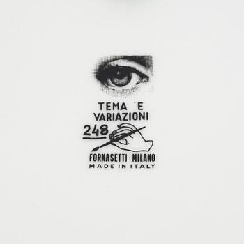Piero Fornasetti, a porcelain dish and a plate, Milano, Italy.