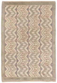 269. Brita Grahn, a carpet, knotted pile in relief, ca 239 x 168 cm (as well as 2,5 and 3,5 cm flat weave on each side), signed.