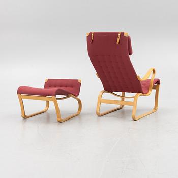 Bruno Mathsson, a 'Migo' armchair with a foot stool, Mathsson International, Värnamo.