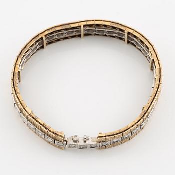 Bracelet in 14K gold and white gold with brilliant-cut diamonds.