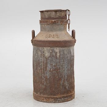 A milk pail, numbered 1803.