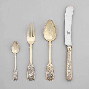 949. A Russian mid 19th century silver-gilt and niello set of four piece cutlery, unidentified makers mark, Moscow 1859.