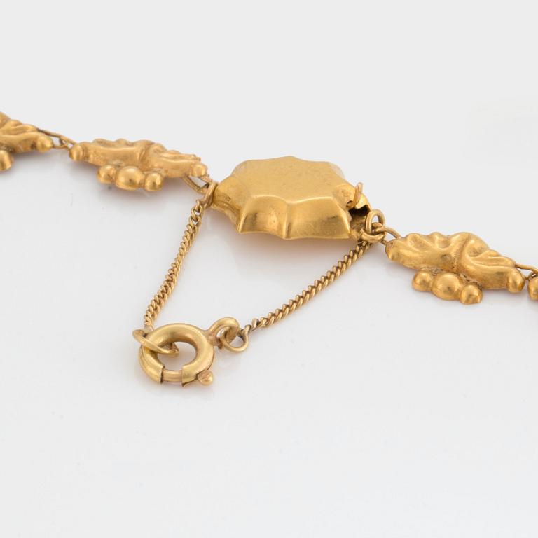 COLLIER med en flodpärla.