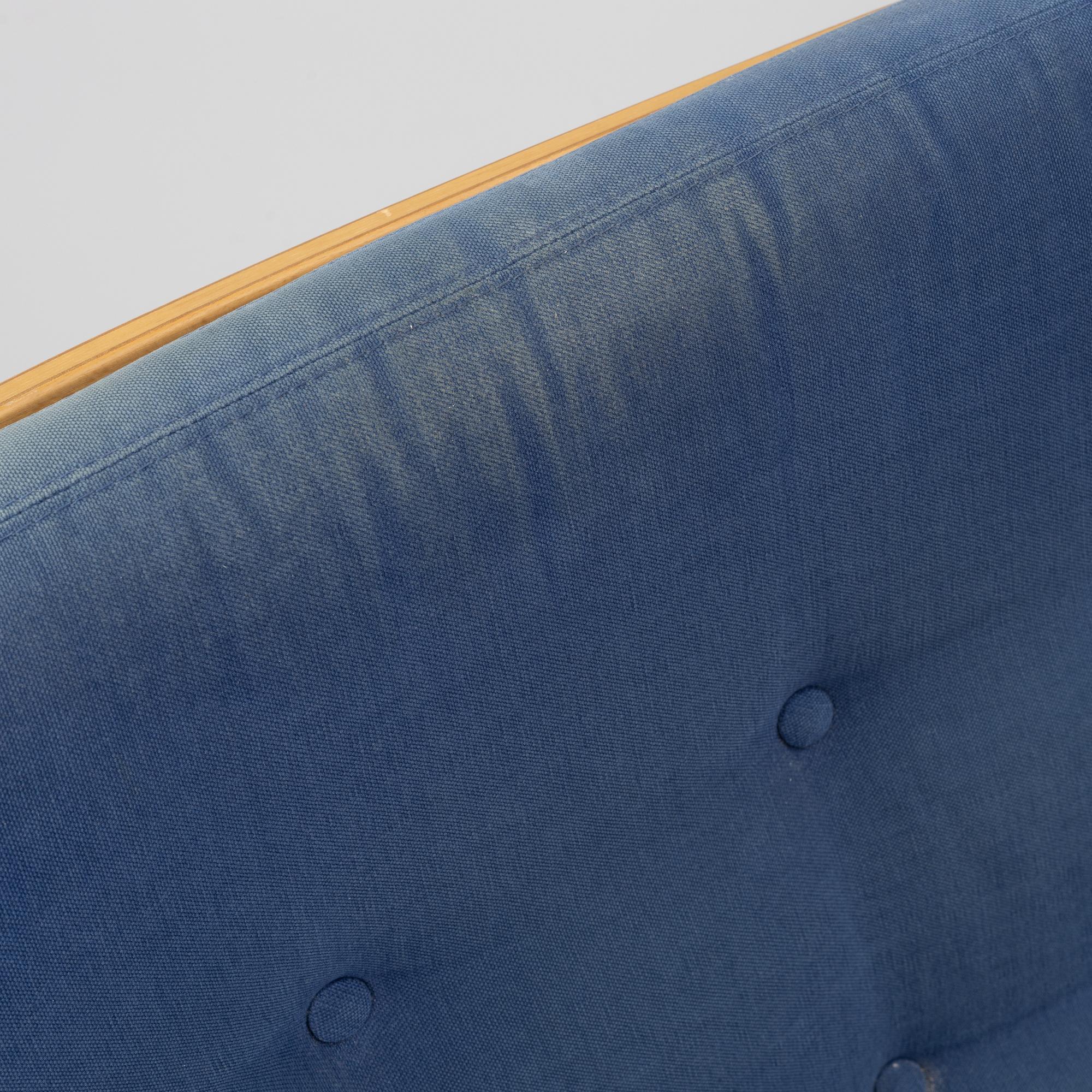 Bruno Mathsson, a pair of armchairs with ottomans, 'Ingrid', Dux, second half of the 20th century.