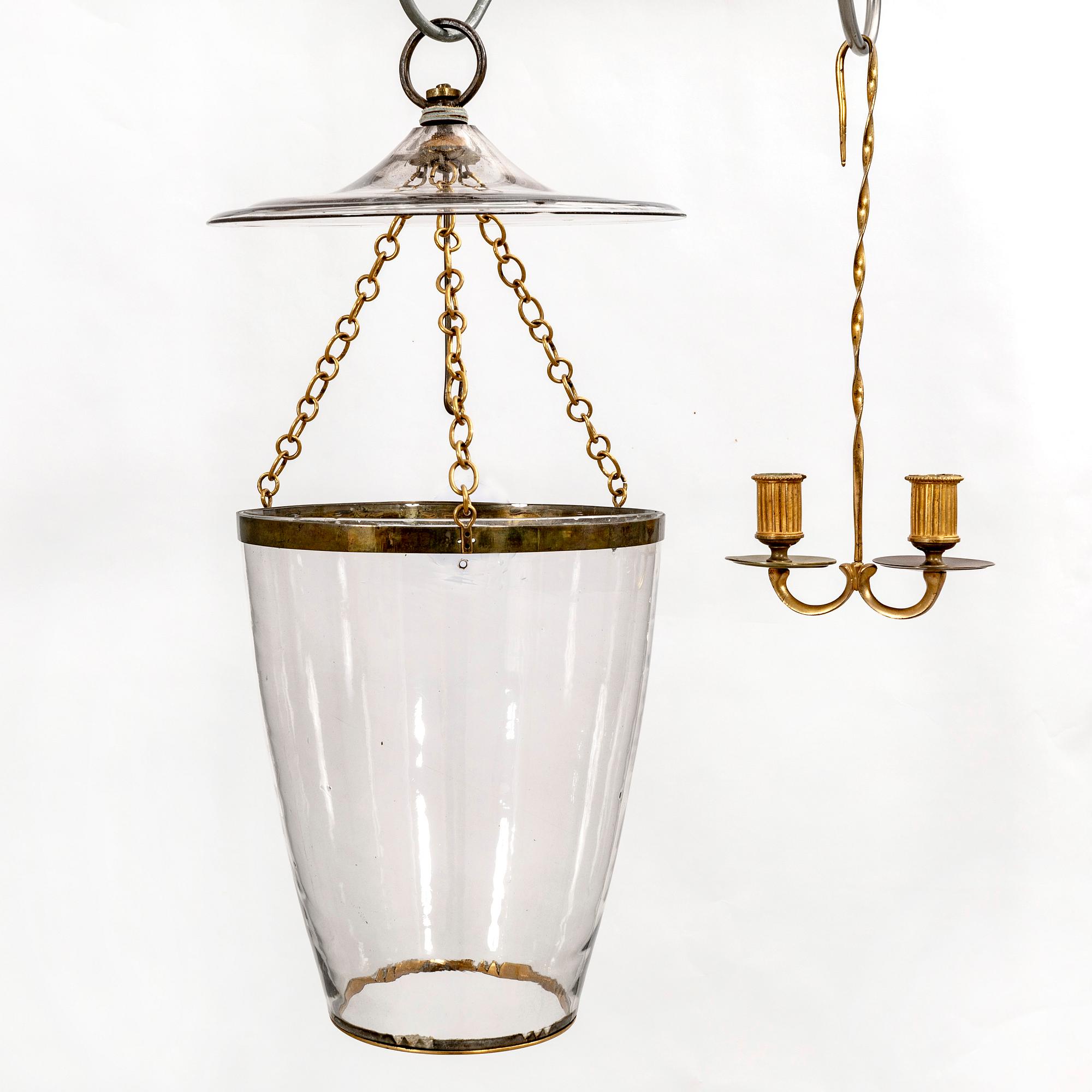 A 20th century glass pendant.