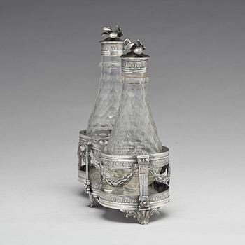 A Swedish 18th century silver and glass cruet-set, mark of Petter Eneroth, Stockholm 1780.