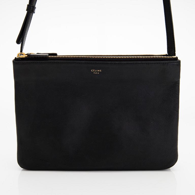 Céline, a black leather 'Trio' bag.